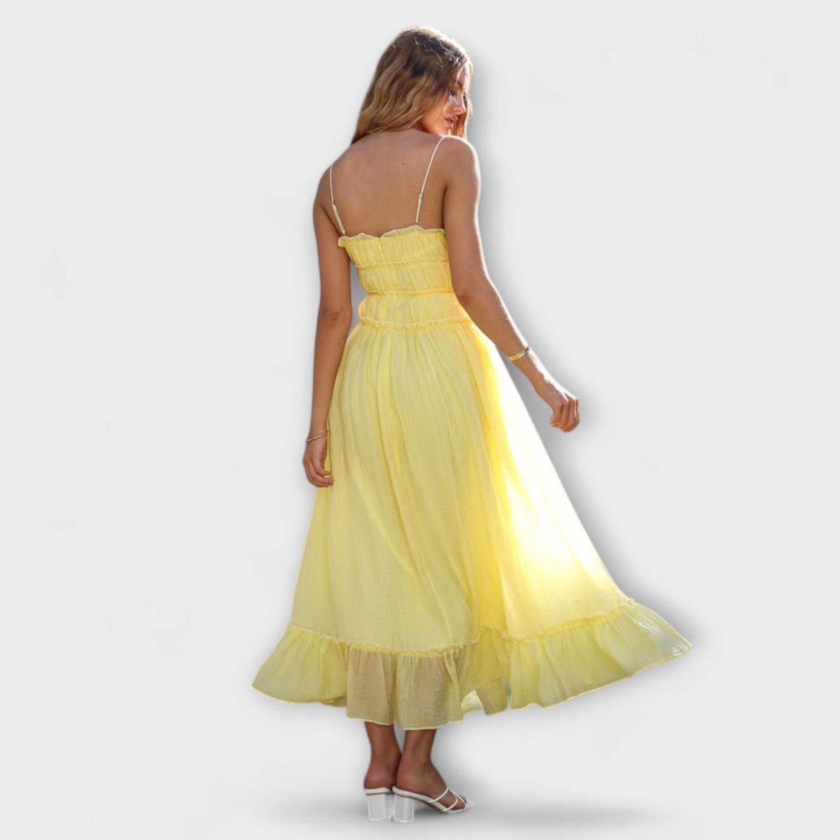 Celine - Vestido midi sin mangas con volantes